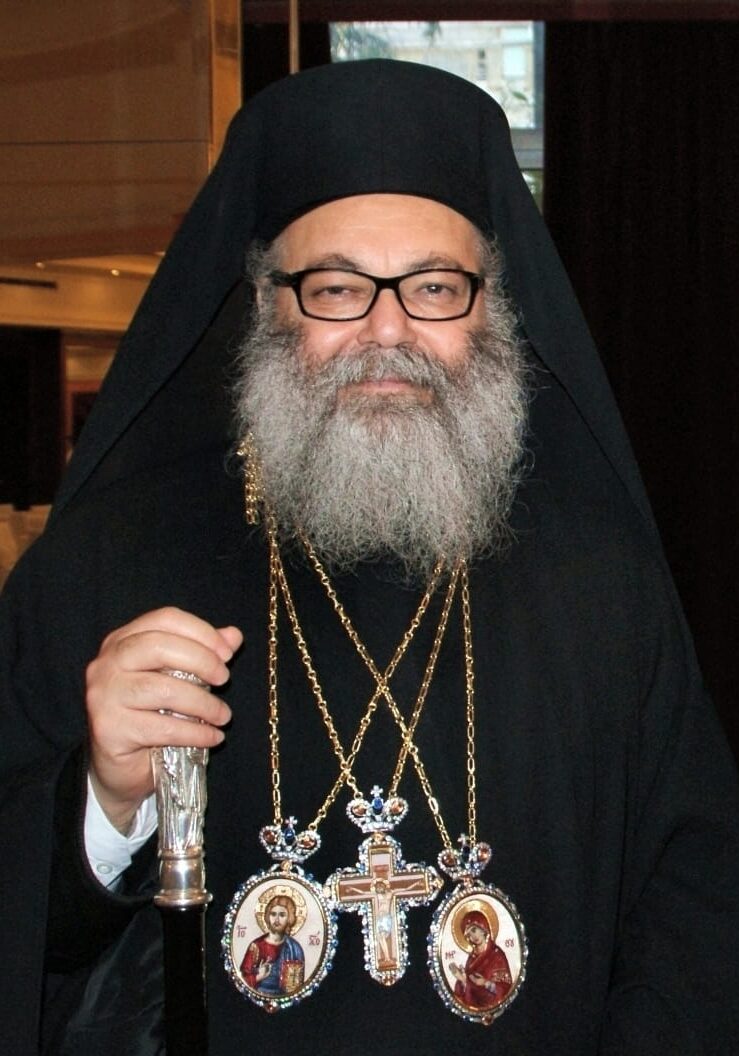 His Beatutide Patriarch JOHN (photo credit: Υπουργείο Εξωτερικών (Ministry of Foreign Affairs, Greece) - Cropped from File:Patriarch John X of Antioch and Konstantinos Tsiaras.jpg, original source Πανηγυρική Λειτουργία της Α.Θ.Μ. Μακαριωτάτου Πατριάρχη Αντιοχείας κ. Ιωάννη Ι’ στη Βηρυττό, CC BY-SA 2.0, https://commons.wikimedia.org/w/index.php?curid=25296462)